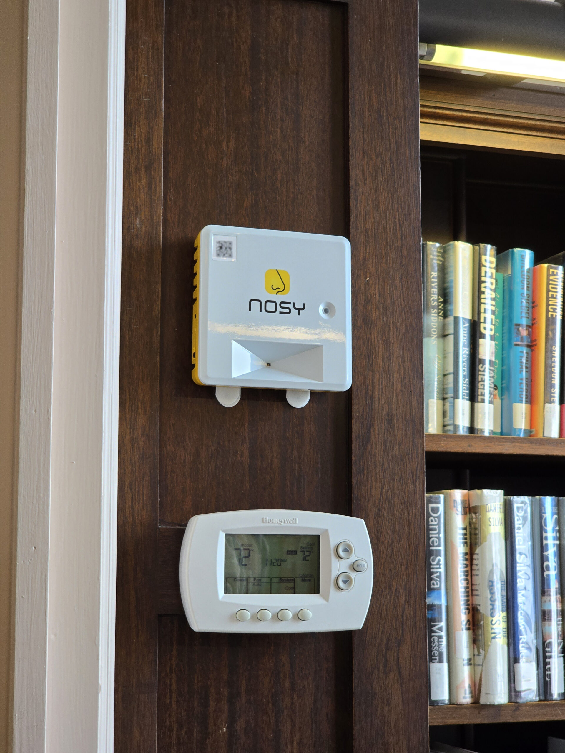 A Nosy building sensor mounted on a wall